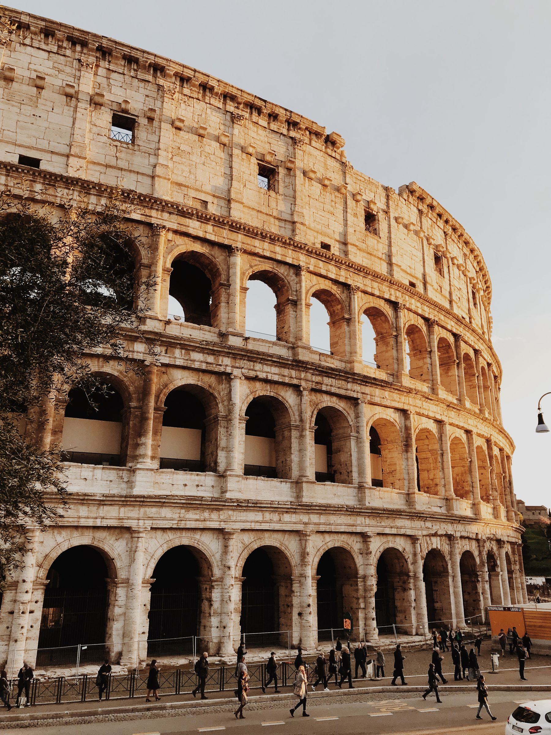 The ancient stone arches of the Colosseum in Rome