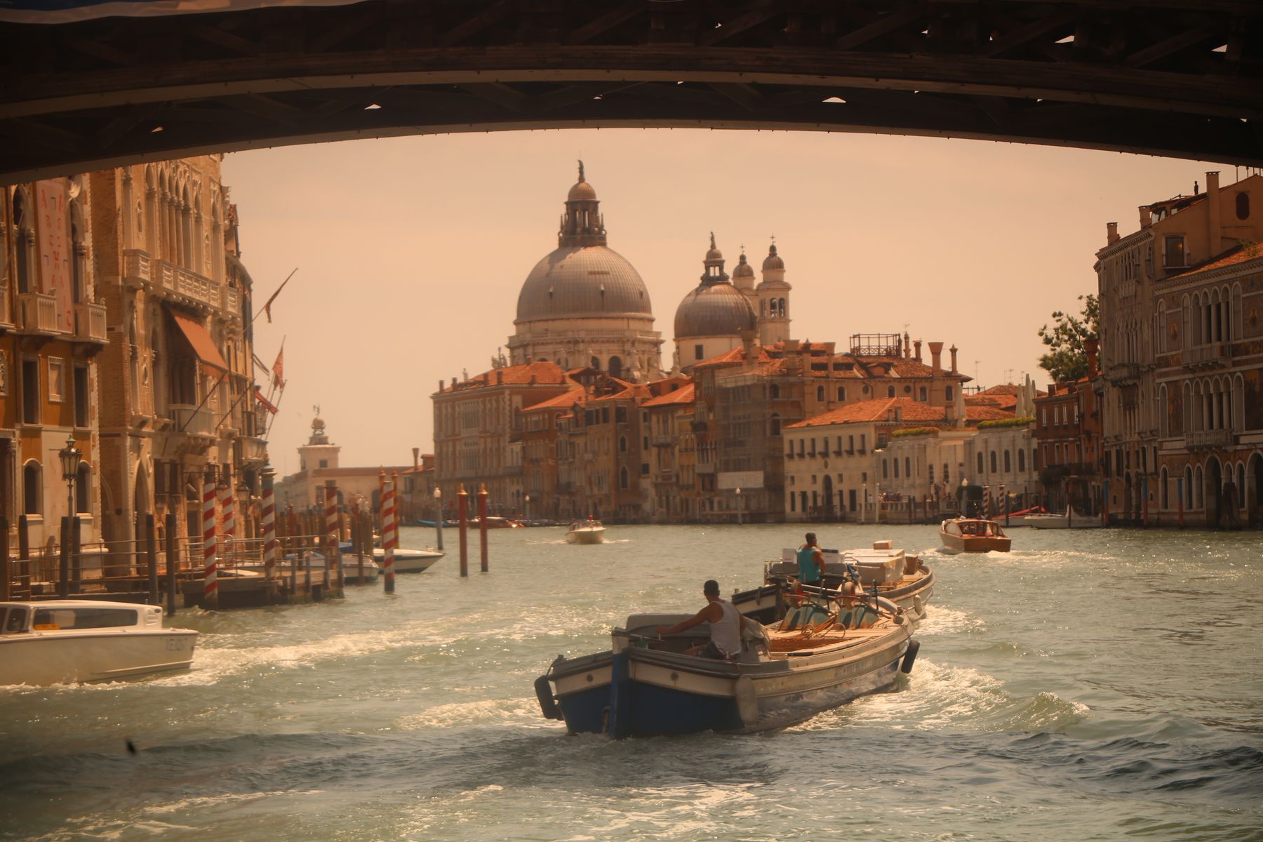 Boats on Venice’s Grand Canal with Santa Maria della Salute beyond